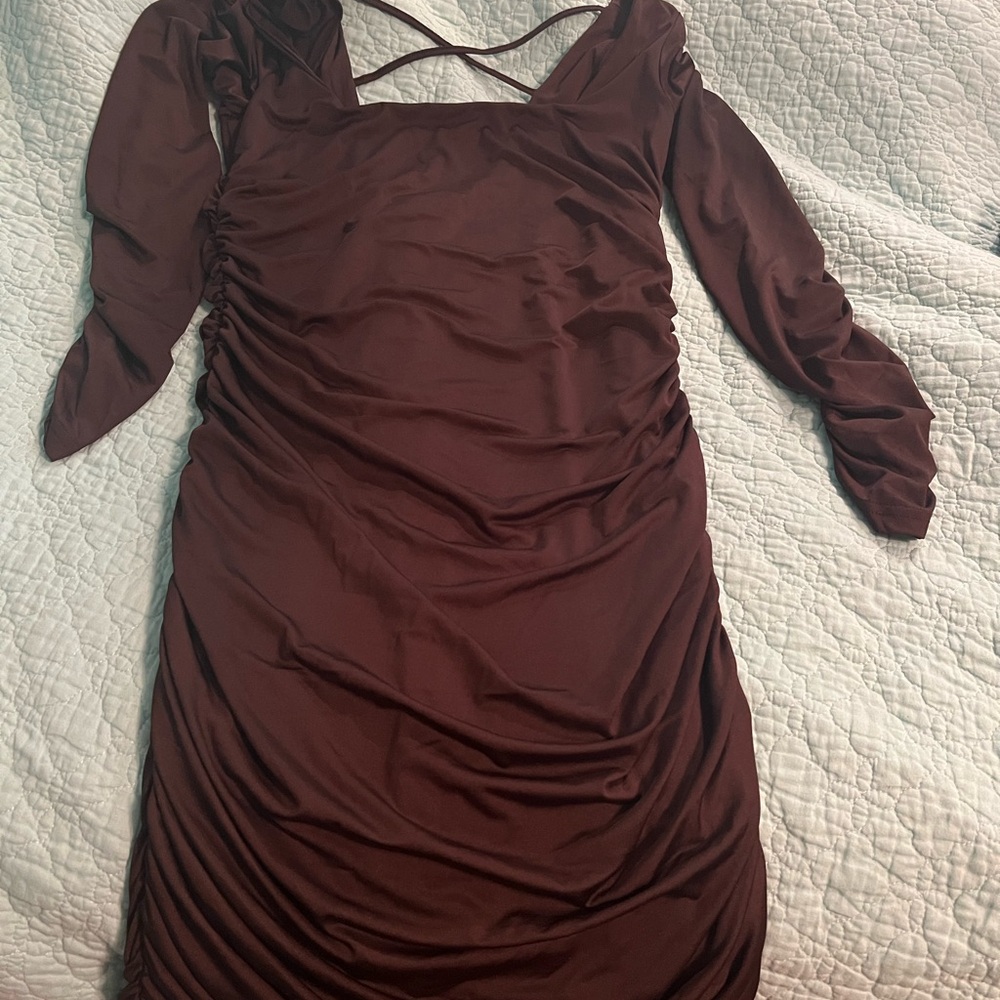 Date party/homecoming dress. Black long ruffle sleeves with open back.